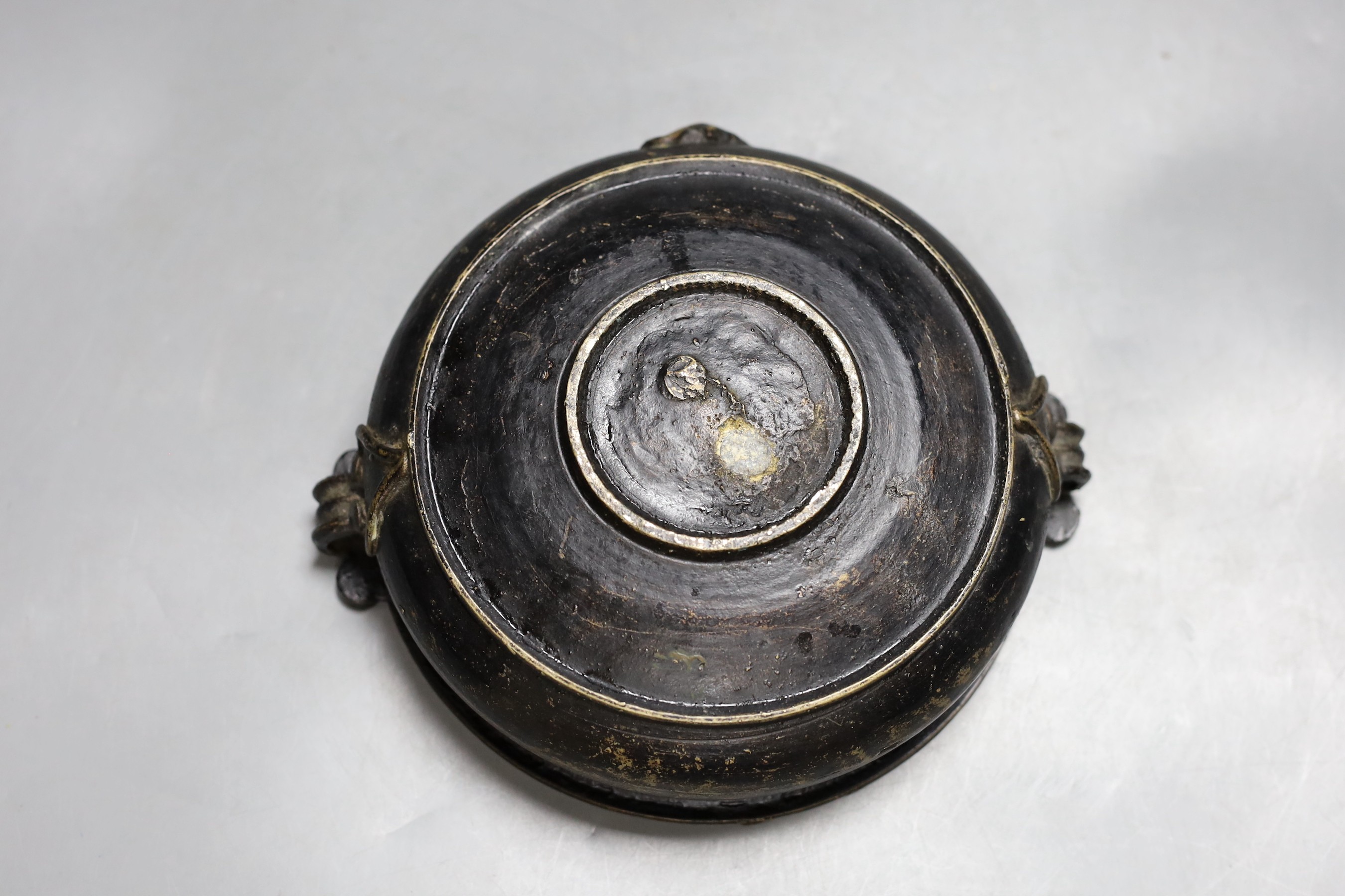 A Southern Indian bronze Urli vessel, 22cm handle to handle